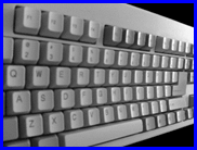 Computer keyboard seen from above and on the left side
